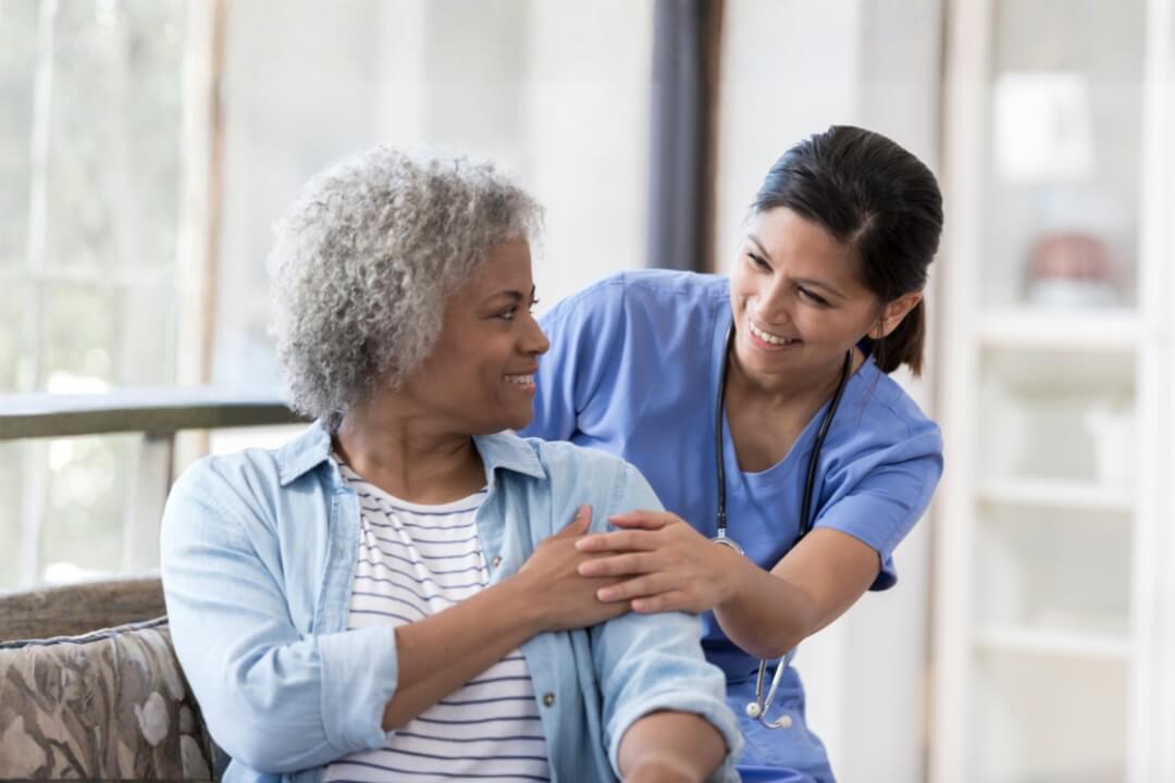 Doctor and patient smiling